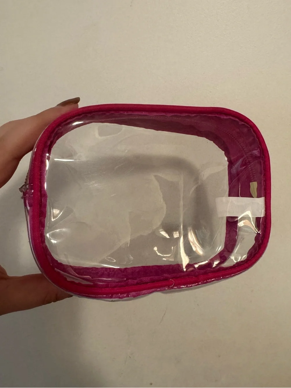Small clear hot pink cosmetic bag